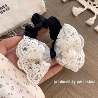  عکس2 اسکرانچی پاپیون دانتل